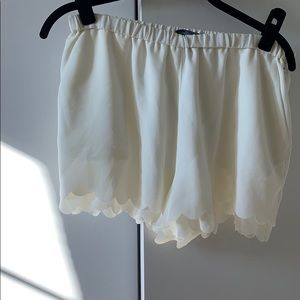 Cream flowery shorts